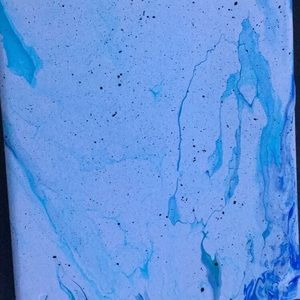 A white multiple blue painting with black dots!!